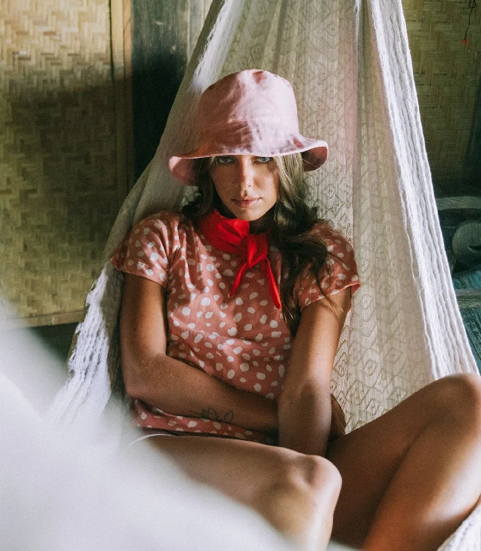 bucket hats for essential accessories for sunny trips-WATU Seaside Linen Bucket Hat, in Salt Pink by BrunnaCo